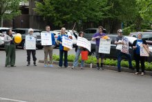 Union members rally in front of Gateway Hall for a fair contract