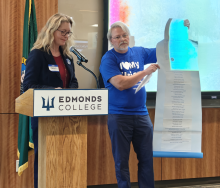 Karen Sanchez and David Breed present a petition to the Board of Trustees